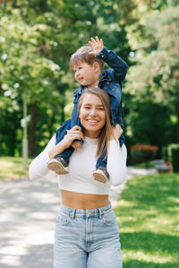 Young mother and son spend a joint weekend on holidays. the concept of a happy harmonious family