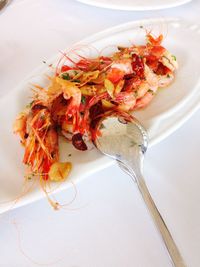 High angle view of meat in plate on table
