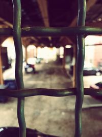 Metal fence against blurred background