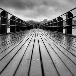 Footbridge against sky