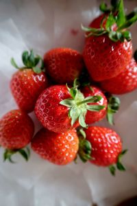 High angle view of strawberries on table