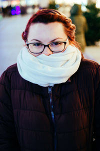 Portrait of young woman with scarf