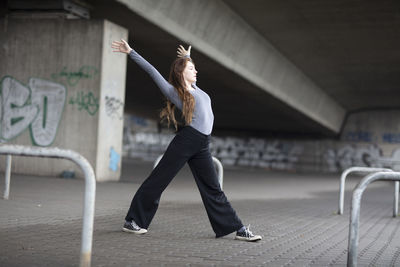 Full length of woman standing outdoors