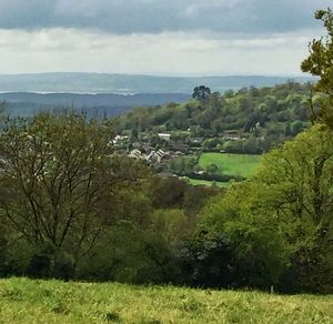 Scenic view of landscape against cloudy sky