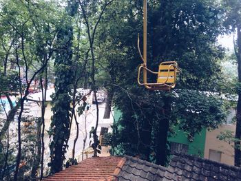 Seat hanging over houses