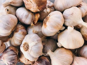 Full frame shot of garlic for sale at market