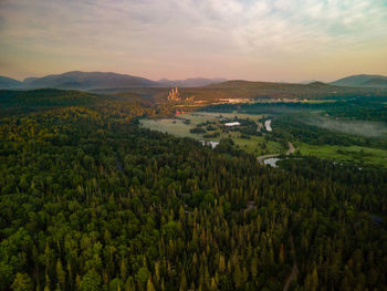 Scenic view of landscape against sky during sunset