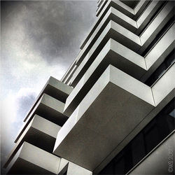 Low angle view of modern building against sky