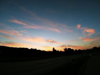 Scenic view of silhouette landscape against sky during sunset