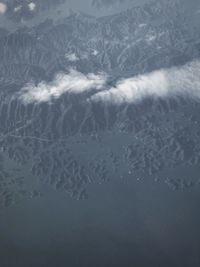 Full frame shot of sea against sky during winter