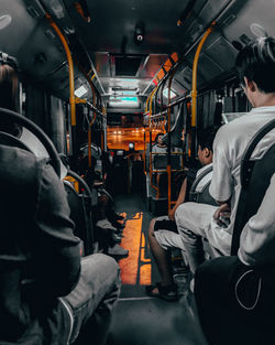 Rear view of people in train