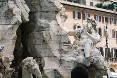 Low angle view of statue of historic building
