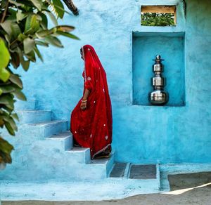 Fire hydrant on wall by building