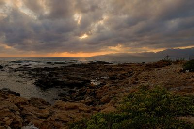 Scenic view of sea against sky during sunset