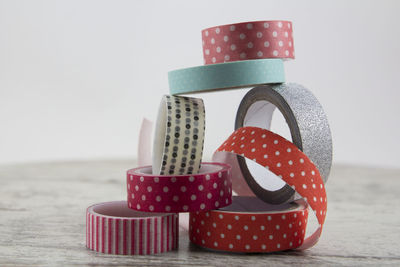 Close-up of red stack on table