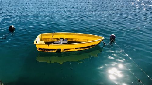 High angle view of man floating on sea