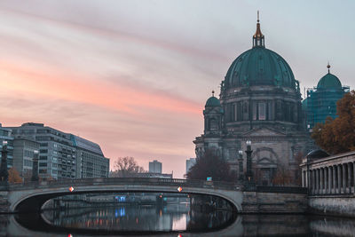 View of buildings against sky during sunset