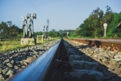 Surface level of railroad track against sky