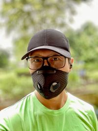 Portrait of young man wearing mask