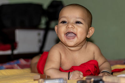 Portrait of cute baby girl at home