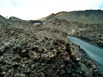 View of rock formation against sky