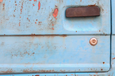 Close-up of old car door handle