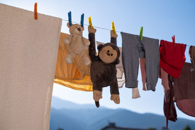Low angle view of clothes hanging on wall