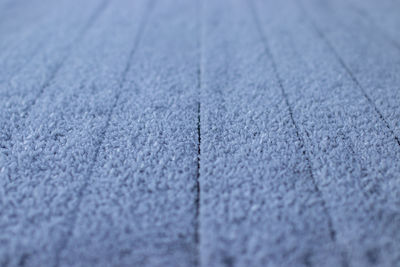 Detail shot of snow on footpath