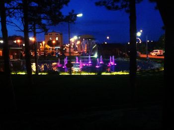 Illuminated street light at night