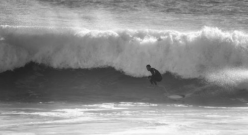 Man surfing in big waves