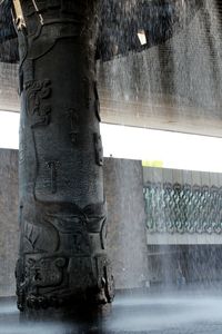 Close-up of statue against temple