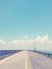 Empty road against sky