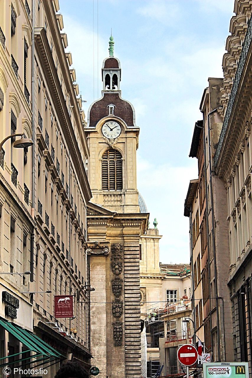 architecture, built structure, building exterior, travel destinations, tower, clock, outdoors, clock tower, sky, city, low angle view, no people, day, time, police station