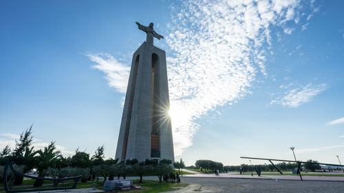 Low angle view of statue against sky