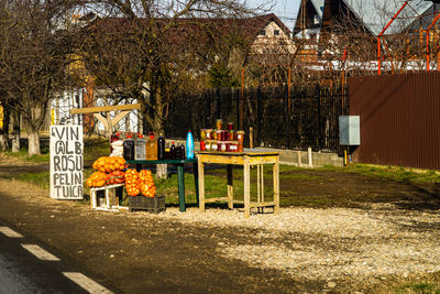 Empty benches and table in park