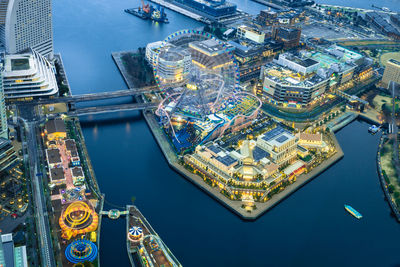 High angle view of illuminated buildings in city