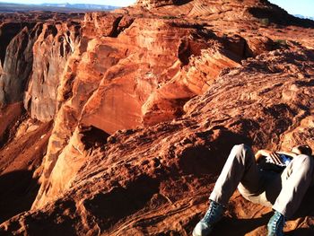 Man standing on rock formation