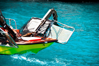 High angle view of boat in turquoise sea, cala d'or, spain