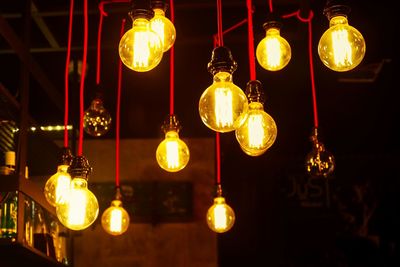 Light bulb hanging on ceiling