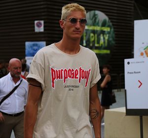 Full length of man standing in front of building