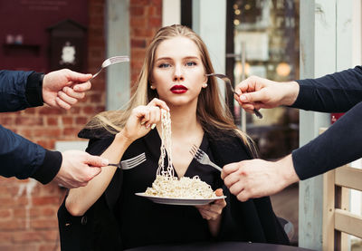 Young woman holding food