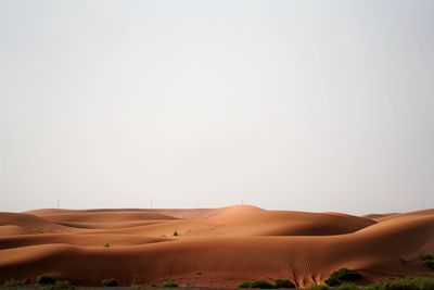 Scenic view of desert against clear sky