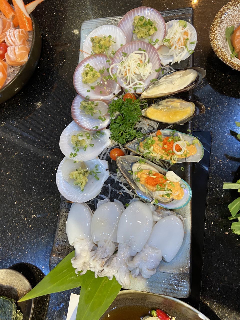 food and drink, food, freshness, healthy eating, meal, high angle view, wellbeing, dish, seafood, table, no people, cuisine, still life, directly above, plate, asian food, flower, japanese food, indoors, serving size, vegetable, sushi, culture