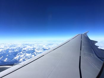 Scenic view of mountains against cloudy sky