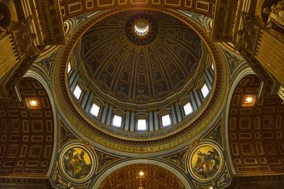 Low angle view of illuminated ceiling of building