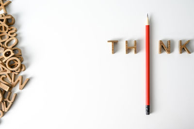 High angle view of pencils on white table