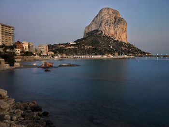 Scenic view of sea and rocks against sky