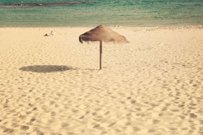 Footprints on sandy beach