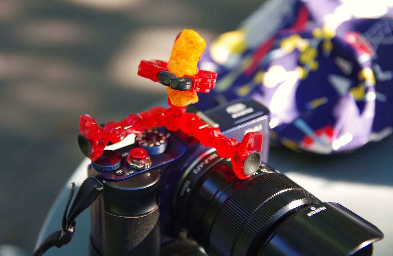 The Cheetos death grip. Toy Toy Photography Cheetos Camera Table Sunlight And Shadow Outdoors Blurred Background Humor Just For Fun Photography Pentax K-5 Close-up