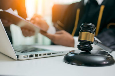 Close-up of hand using mobile phone